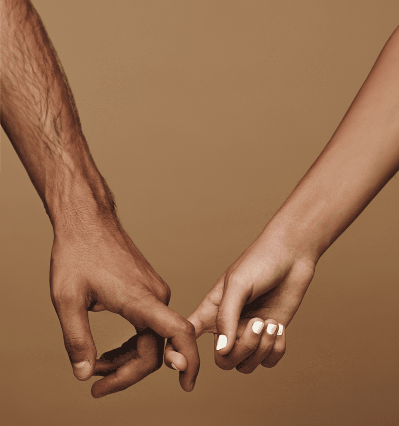 man and woman holding hands man and woman holding hands